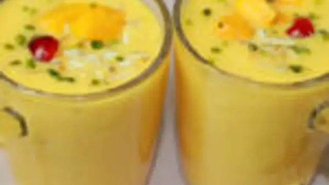 மாம்பழ மில்க் ஷேக் ஒரு முறை  இப்படி செய்தால், இனி மாம்பழமாக சாப்பிட மாட்டீங்க , மில்க் ஷேக் தான் செய்து குடிப்பீர்கள்!